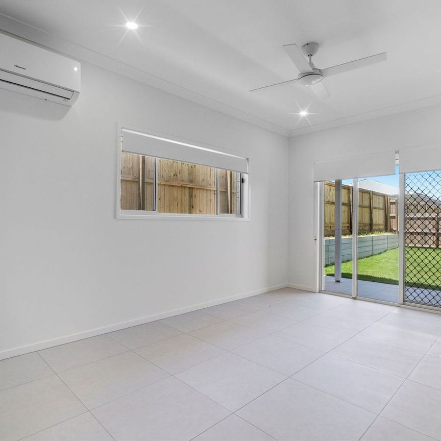 Modern Family Living – Brand New 4 Bedroom Home with Spacious Yard - Photo 1