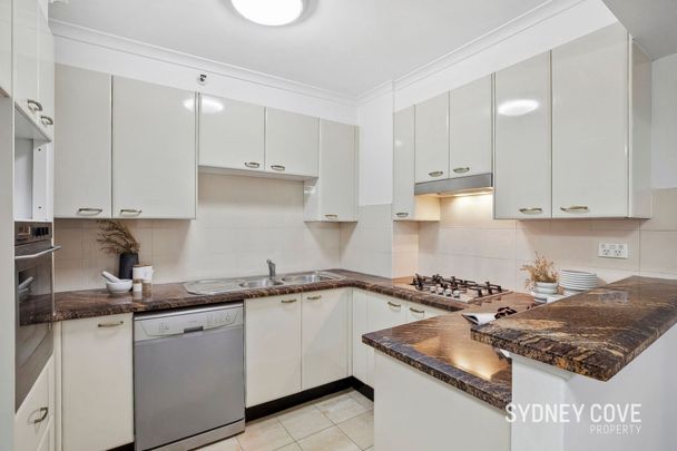 BEAUTIFULLY RENOVATED APARTMENT IN THE CENTRALLY LOCATED MILLENNIUM TOWER BUILDING | Unfurnished - Photo 1