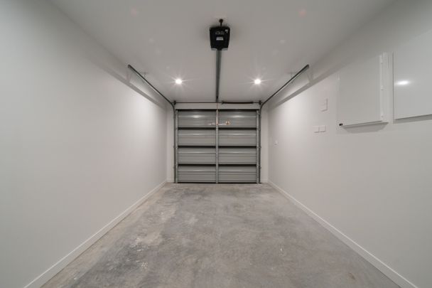 Modern new 2 bedroom Unit + Garage - Photo 1