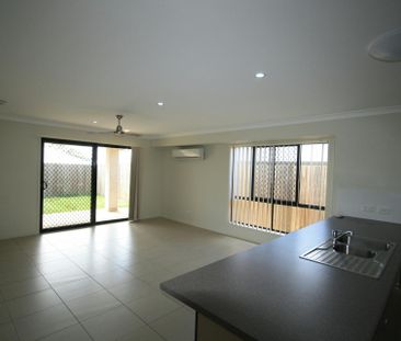 LOW MAINTENANCE 4 BEDROOM FAMILY HOME - Photo 1