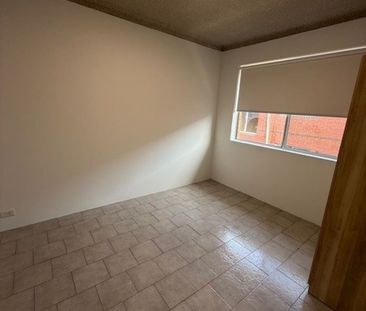 Modern & Convenient 2-Bedroom Unit – Updated & Ready to Move In! - Photo 4
