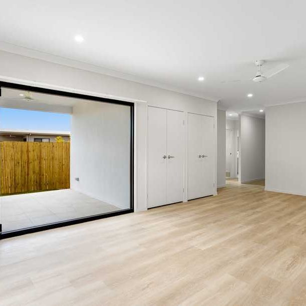 Modern Family Home with Indoor / Outdoor Living and Solar! - Photo 1