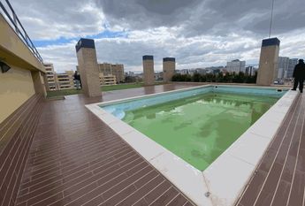 Apartamento T2 para arrendamento sem móveis com piscina nas Laranjeiras, Lisboa