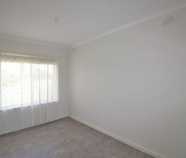 Modern 2 Bedroom Unit with Large Rear Yard - Photo 1