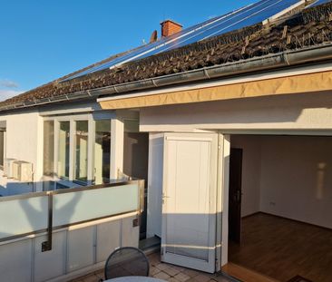 HELLE OBERGESCHOSSWOHNUNG MIT TERRASSE UND ÜBERDACHTEM PARKPLATZ - Photo 4