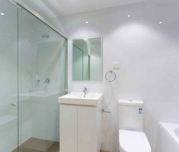 MODERN TWO BEDROOM APARTMENT IN A GREAT LOCATION - Photo 5