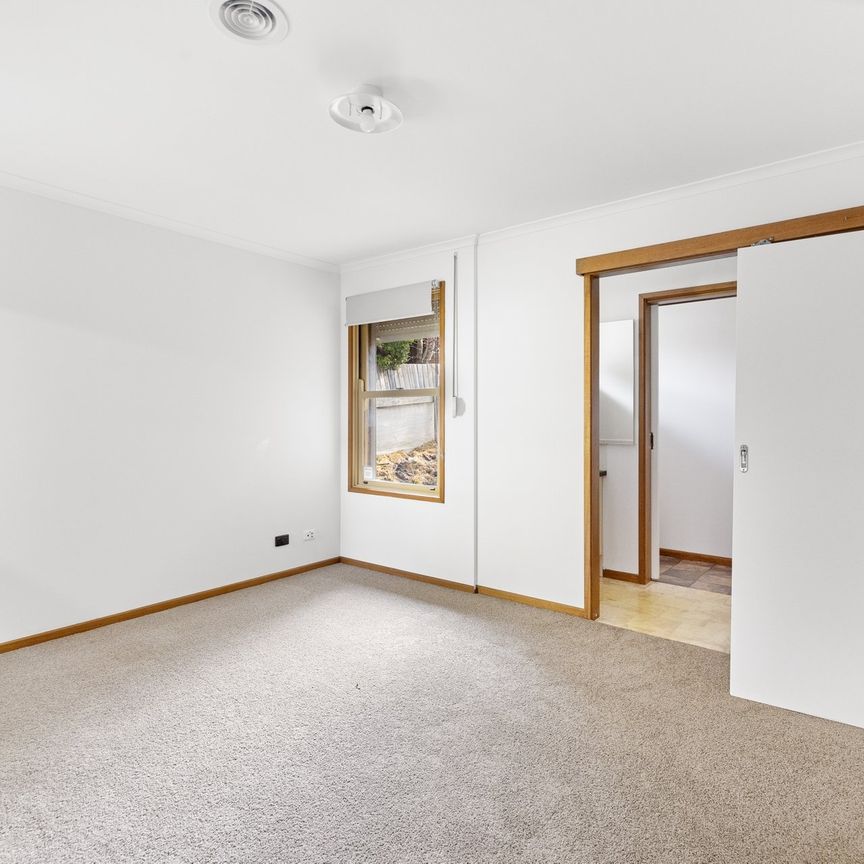 Conveniently Located Three bedroom Home - Photo 1