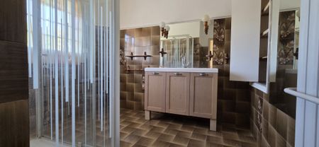 Location Maison 4 pièces 116m² GIGNAC 34150 - Photo 3