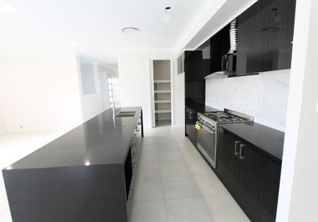 4 Daintrees St, Campbelltown NSW 2560 - Photo 3