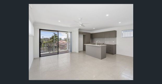 Seamless Mix of Style and Convenience: Spacious 2-Bedroom Townhome - Photo 1