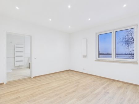 Familienidylle vor den Toren Münchens: Neuwertige Haushälfte mit viel Platz und großem Garten - Foto 3