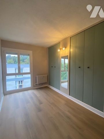 Appartement F3 avec balcon, garage et 2 caves dans une résidence sécurisée - Photo 2