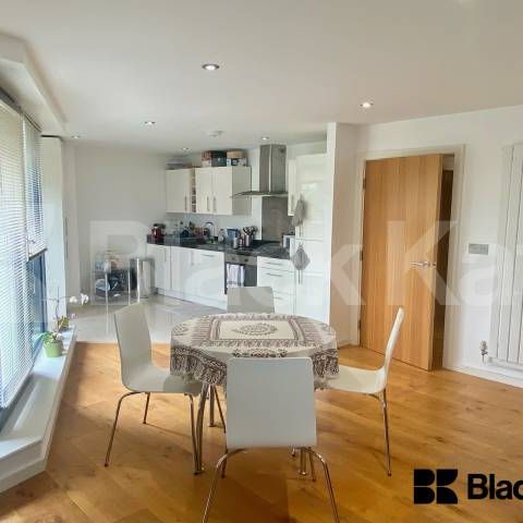 Flooded with natural light, contemporary& superbly located - Photo 1