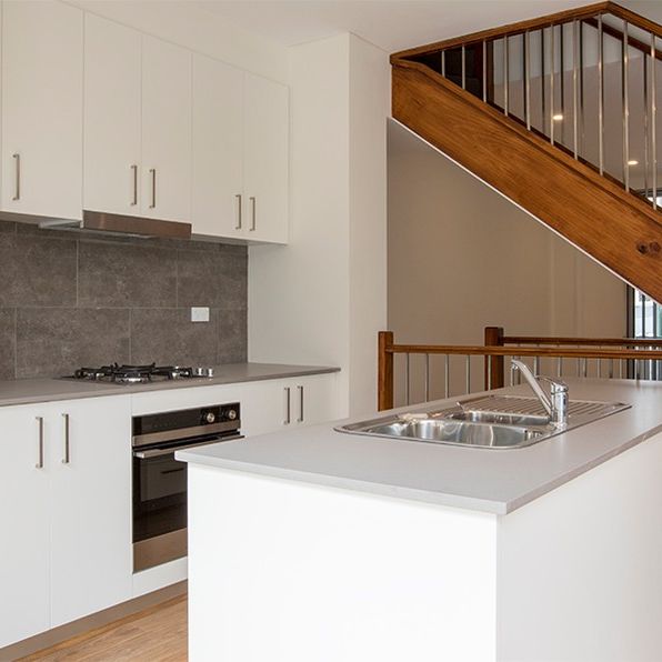 Vibrant Split-Level Townhouse in the Heart of Alexandria - Photo 1