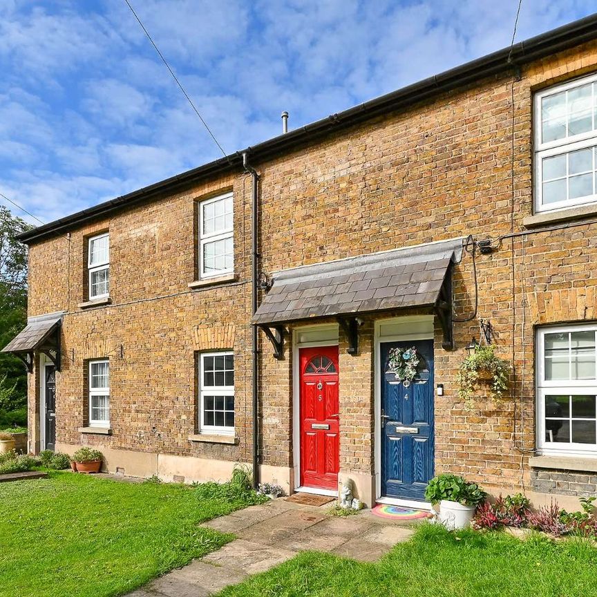 A spacious three bedroom home with allocated parking for two cars. - Photo 1