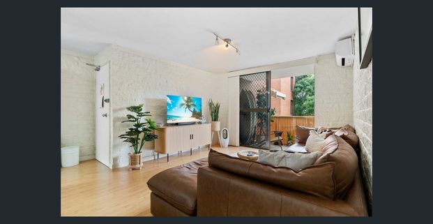 Beachside Convenience – Neat & Tidy Two-Bedroom Unit - Photo 1