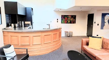 **2026 Heritage Meets Modern Luxury - Fully Furnished Apartment in the Empire Building** - Photo 4