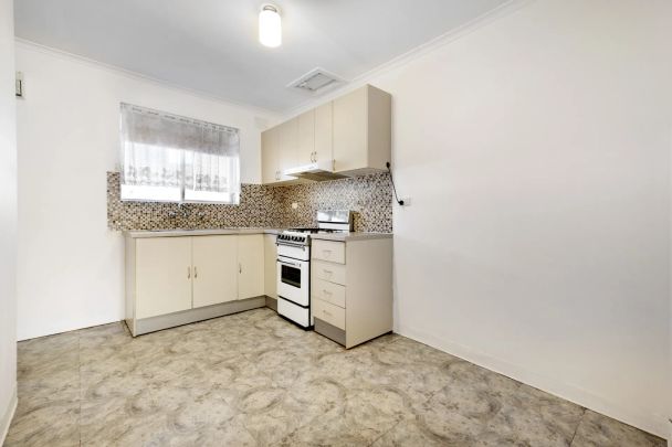 Neat Two Bedroom Unit in Convenient Location with Communal Swimming Pool - Photo 1