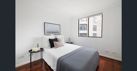 Two-bedroom city apartment in private rear position, pets considered on app - Photo 2