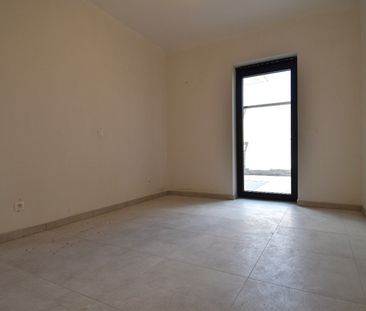 Gelijkvloers 1-slaapkamerappartement met terras te huur in centrum ... - Photo 1