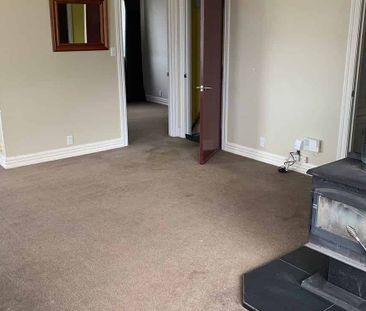 Charming 2BR Home with Deck & Shed! - Photo 3