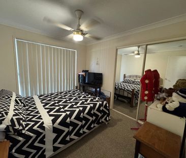 Comfortable Family Living with Large Backyard & Pool in Secure Complex - Photo 4