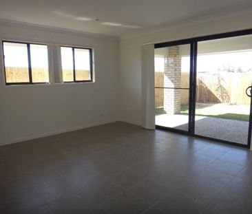 Great Family Home in Sought-After Coomera Grand Estate - Photo 1