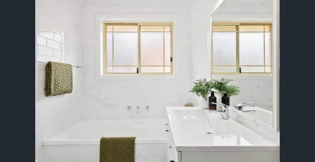 Perfectly Positioned - Walk to Town! - Photo 1