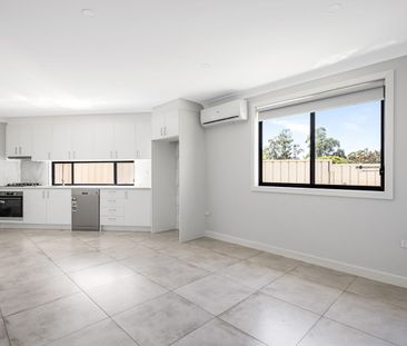 Step into comfort and modern living! - Photo 1