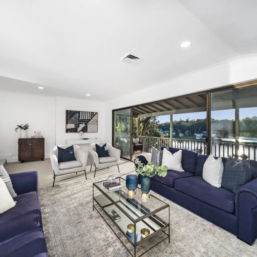 Prestigious Waterfront Haven in Idyllic Blue-Chip Location - Photo 1