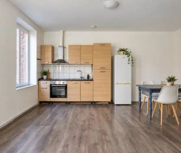 Ruim en lichtrijk 2-slaapkamerappartement in het centrum van Ronse - Foto 4