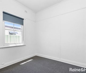 RENOVATED THREE BEDROOM HOME, MINUTES AWAY FROM BELMONT CITY CENTRE - Photo 2