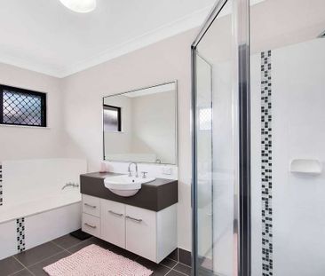 This stunning 4 bedroom home states class all over! - Photo 6