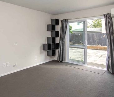Sunny Two-Level Unit with Private Courtyard - Photo 1