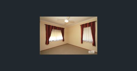 Charming 3 Bedroom Home with Large Entertaining Deck - Photo 2