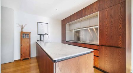 Stylish City-Fringe Apartment with Huge Private Deck - Photo 5