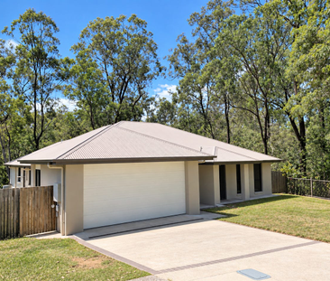 Spacious Family Home with Bushland Views – Bellbird Park - Photo 1