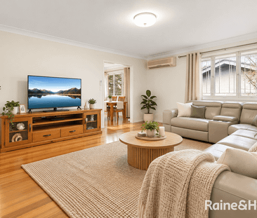 Two Levels. Two Living Zones. One Very Flexible Family Home. - Photo 1