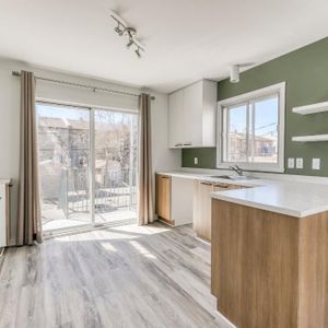 SAINTE-THÉRÈSE 4 1/2 **SUPERBE LOGEMENT COMPLÈTEMENT RÉNOVÉ ET BIEN SITUÉ!** - Photo 2
