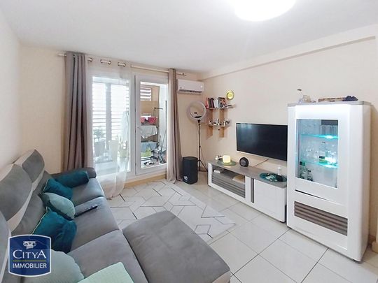 Location Appartement 3 pièces 63m² LA POSSESSION 97419 - Photo 1