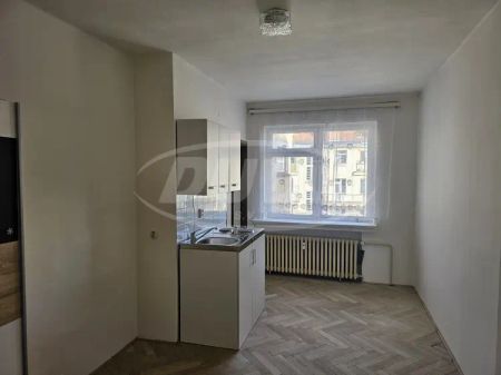 Byt 1+kk (23 m - Photo 2