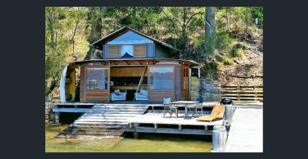 Waterfront Luxe – Architecturally Designed Home with Boatshed - Photo 2