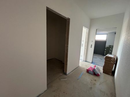 Erstbezug mit Aufzug und EBK in Tessin! - Photo 5