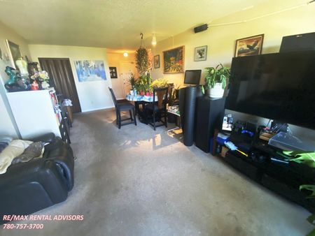 GREAT 2 BED 1.5 BATH 4TH-FLOOR APARTMENT W/AN OUTDOOR PARKING STALL IN THE COMMUNITY OF BELMEAD - Photo 5