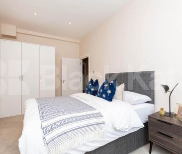 stunning 1 bedroom apartment with loft style features in a modern d... - Photo 2