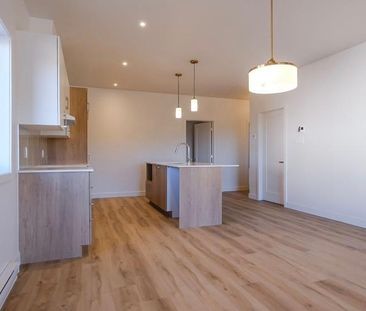 4 1/2 condo locatif neuf - Photo 1