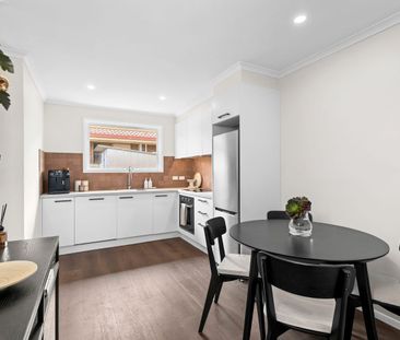 Renovated Two-Bedroom Unit in Prime Newcomb Location - Photo 6