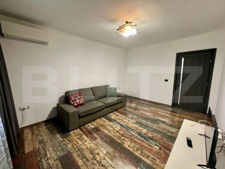 Apartament cu 2 camere, parter, centrala si AC, zona central - Photo 2