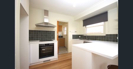 Superbly located and fully renovated home in Belmont. - Photo 4