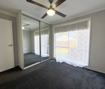 Peaceful Suburban Living in a Central, Well-Connected Location - Photo 6